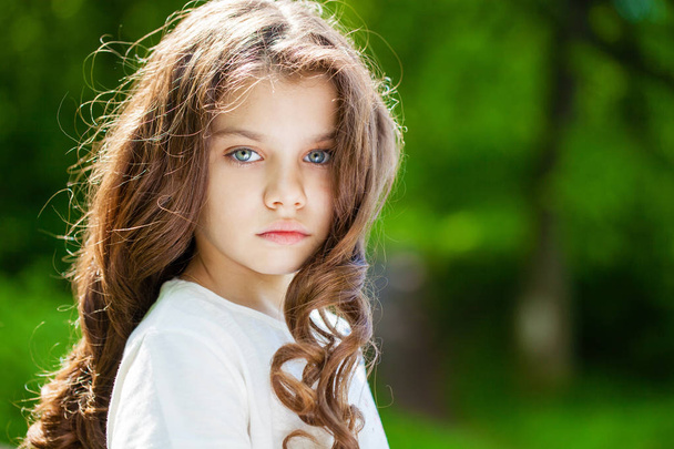 Portrait of a beautiful young little girl  - Photo, Image