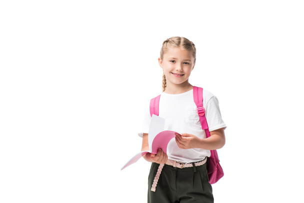 schoolgirl holding textbook - Foto, imagen