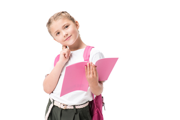 schoolgirl holding textbook - 写真・画像