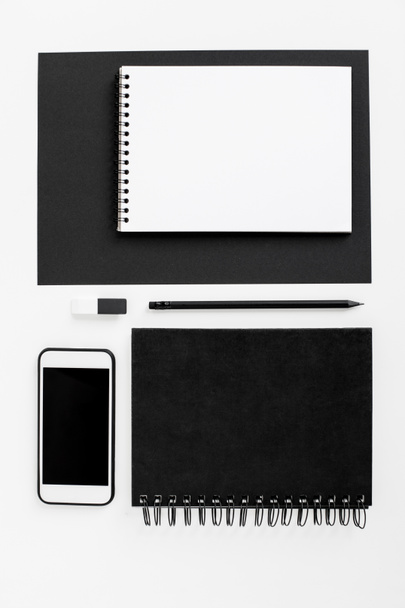 smartphone, notepads and office supplies - Φωτογραφία, εικόνα
