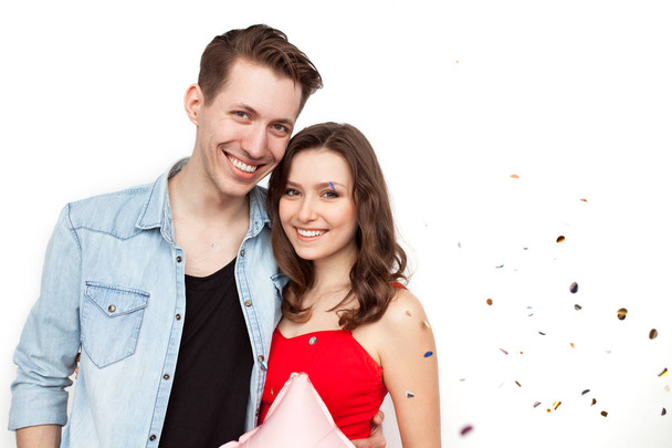 Beautiful couple posing in confetti - Fotoğraf, Görsel