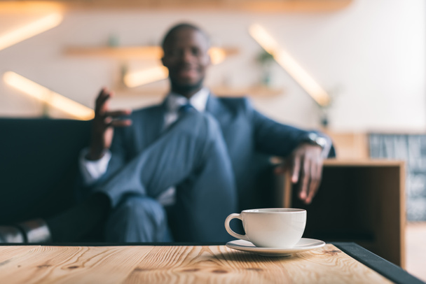 african american businessman with coffee - Photo, Image