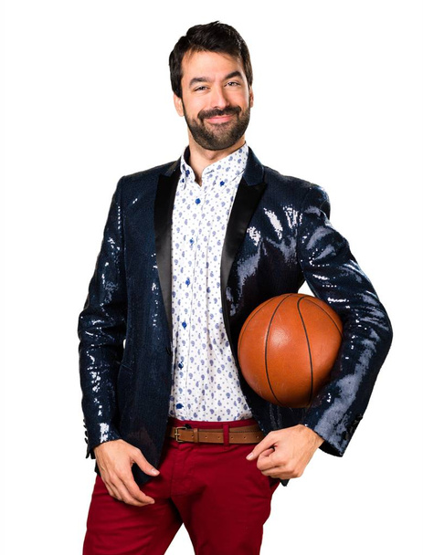 バスケット ボールを保持しているジャケットの男 - 写真・画像