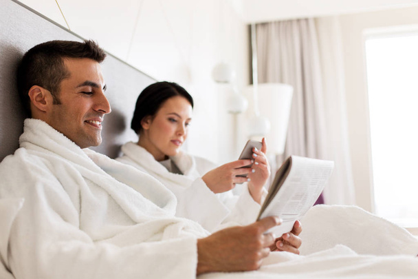 happy couple in bed at home or hotel room - Photo, image