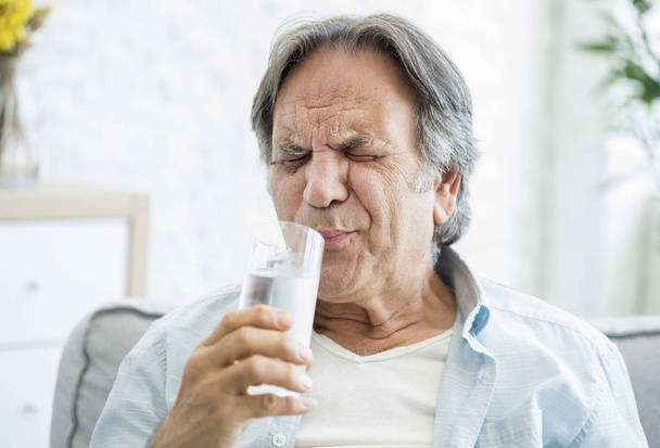 Old man with tooth sensitivity - Foto, Imagen