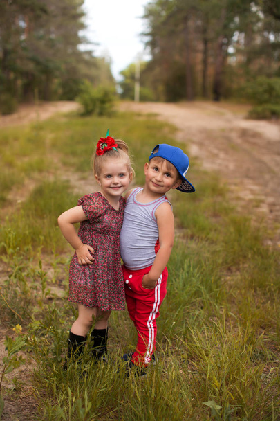 Funny children in the summer park - Foto, afbeelding