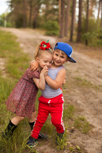 Funny children in the summer park - Fotografie, Obrázek