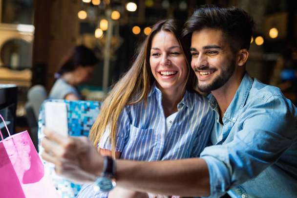Young attractive couple on date in coffee shop - Foto, Bild