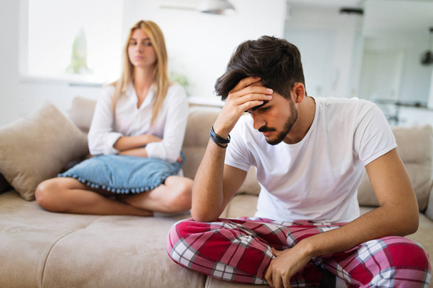 Unhappy couple having crisis and difficulties in relationship - Photo, image