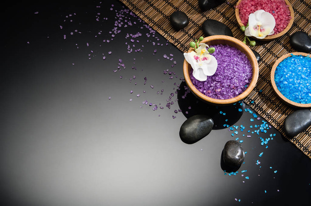 Spa concept on black background. Top view with copy space - 写真・画像