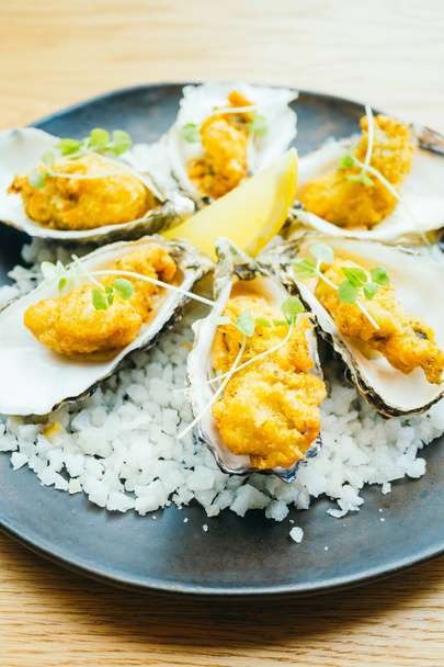 Fried oyster shell with sauce - Photo, Image