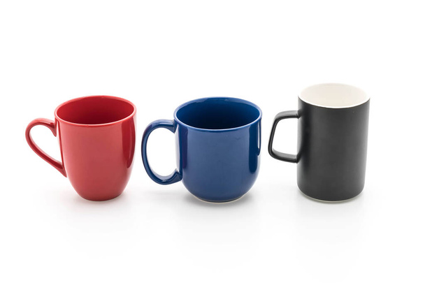 Set of black, red and blue cups on white  - Photo, image