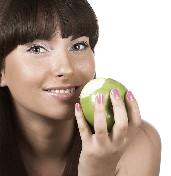 Young girl eating apple - Fotoğraf, Görsel