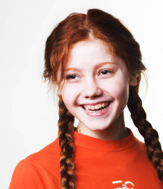 lovely redhead girl with long braids - Fotoğraf, Görsel