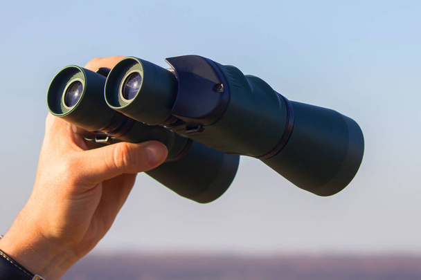 binocular in mans hands - Photo, Image