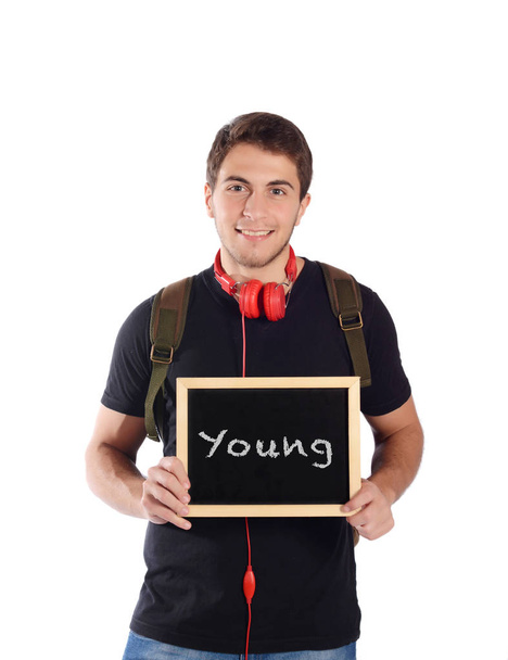 Man holding chalkboard with "young". - Fotografie, Obrázek