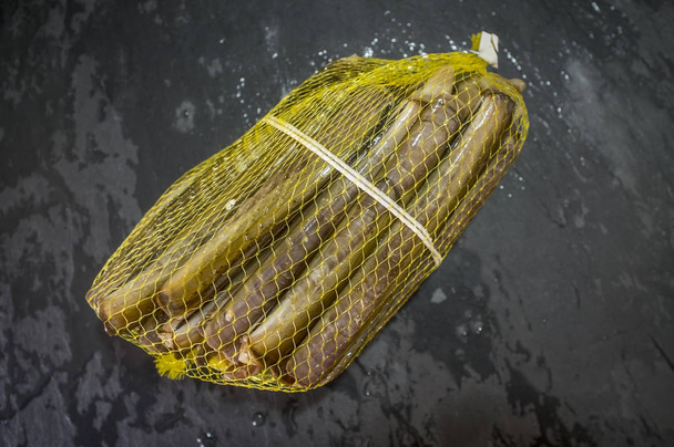 Köteg-ból razor kagyló a műanyag háló - Fotó, kép