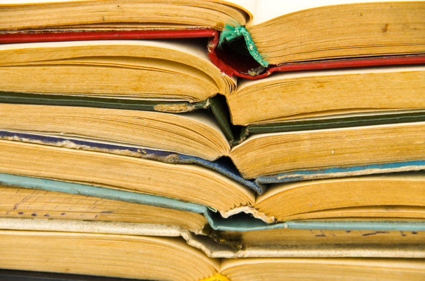 Stack of old open books. Books background - Photo, Image