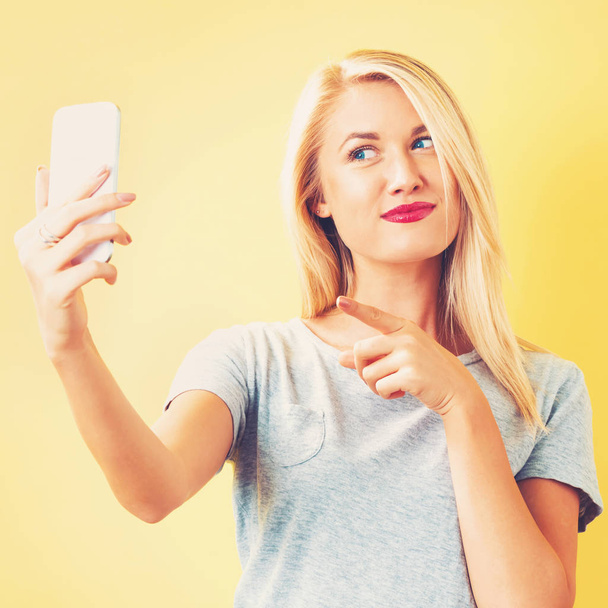 woman taking selfie  - Фото, изображение