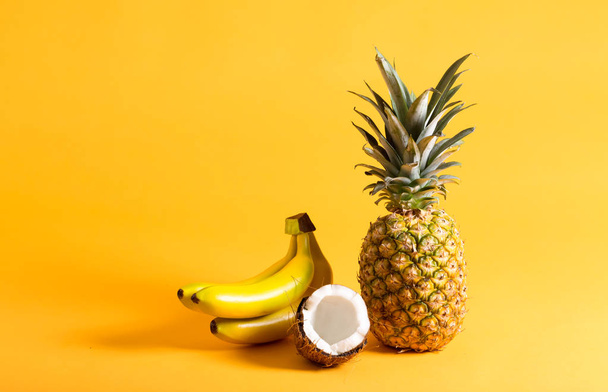 Pineapple, bananas and coconut - Foto, afbeelding