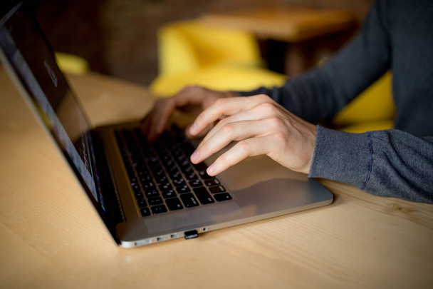 Laptop computer closeup of man browsing internet - Photo, Image