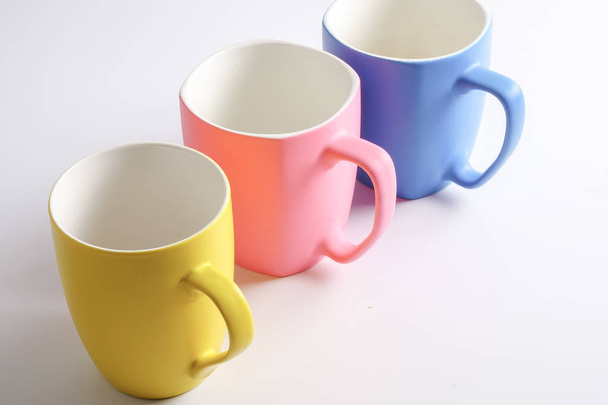 Colored mug isolated on white - Foto, Imagem