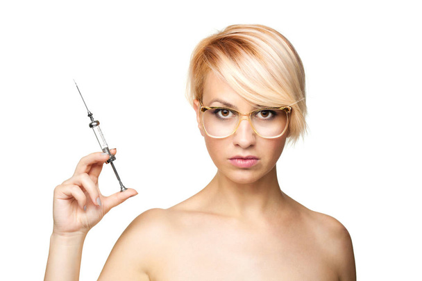 blond nurse with a syringe - 写真・画像