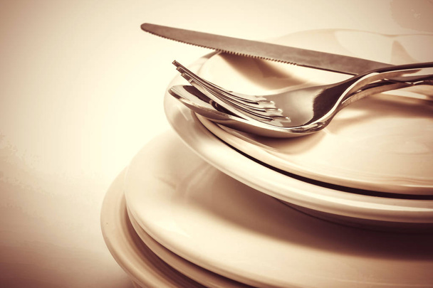 közelről étkező evőeszközök villa, kanál és kés edényt - Fotó, kép