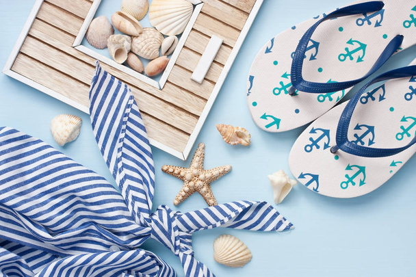 Composition with sea shells and summer accessories - Фото, зображення