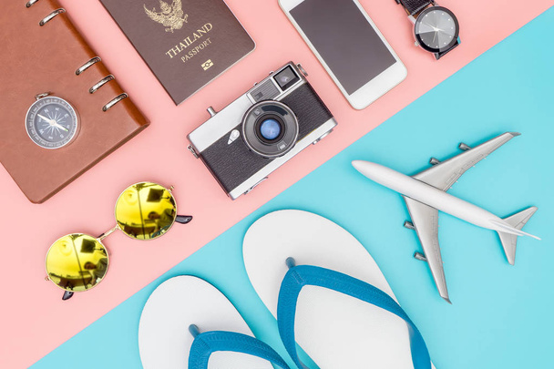 Summer travel fashion and objects on pastel background - Photo, Image