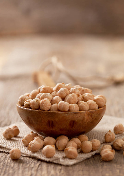 Chickpeas in a wooden spoon  - Foto, Imagem