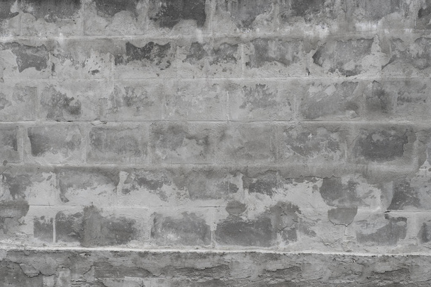 古い風化灰色のレンガの壁の背景  - 写真・画像