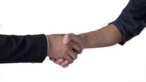 Twee mannen schudden elkaar de hand - Foto, afbeelding
