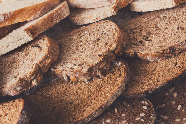 Bakery concept. Plenty of sliced bread background - Photo, image