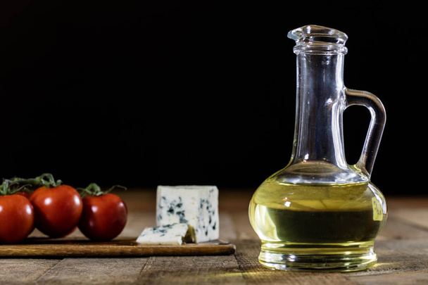 Italian tasty food, olive oil, white cheese and tomatoes. - 写真・画像