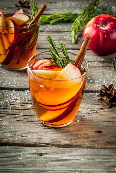 Hot cocktail with apple, rosemary, cinnamon - Фото, изображение