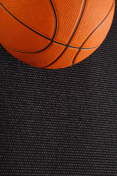Basketball ball on black background copy space - Photo, Image