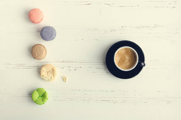 Coffee and colorful macaroons - Photo, Image