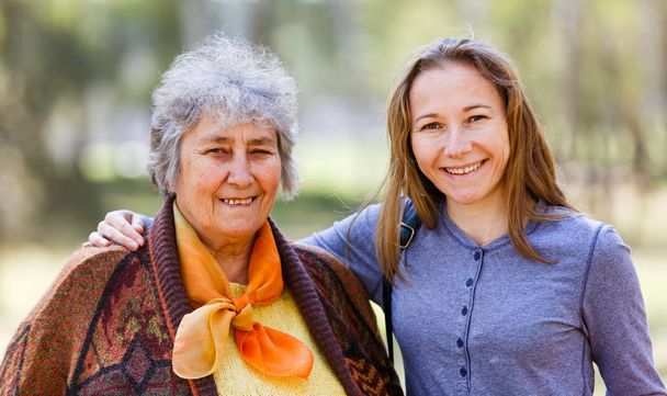 Happy elderly woman with her daughter - Photo, Image