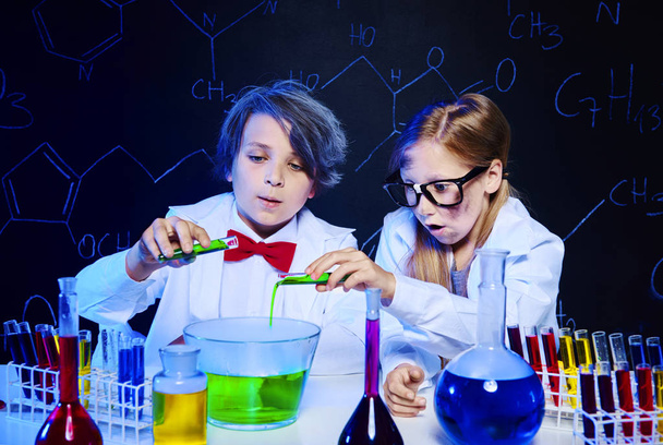 kids making chemical experiment - Photo, image