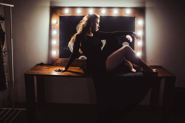 woman on wooden table near mirror - Fotografie, Obrázek