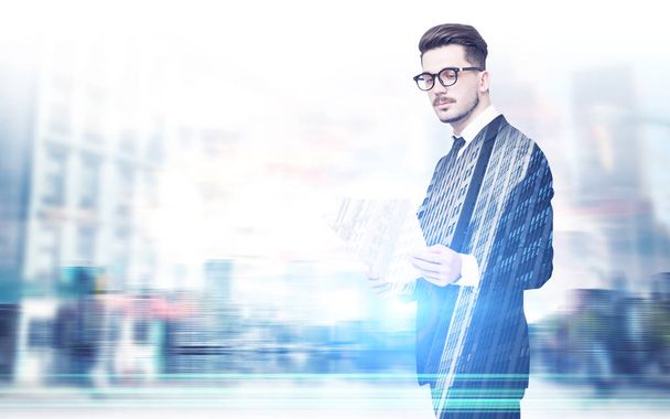 Businessman in glasses, documents, city - Photo, image