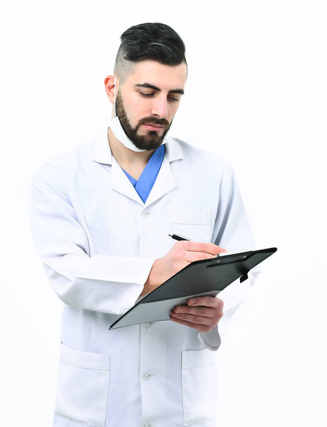Man with busy and serious face in white coat - Foto, afbeelding