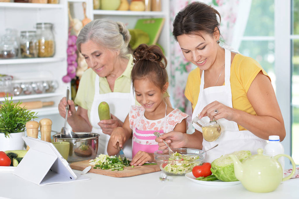 family preparing dinner - Фото, изображение