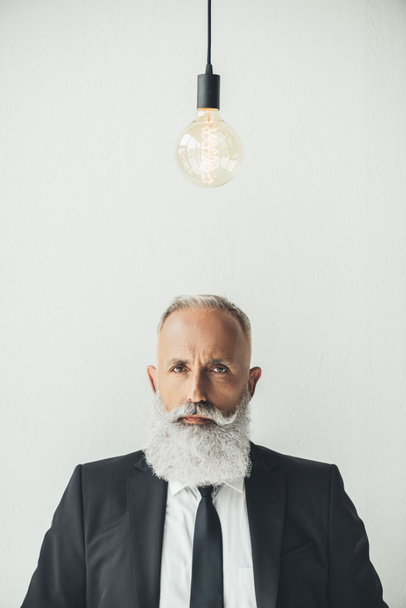 businessman with idea light bulb - Fotografie, Obrázek