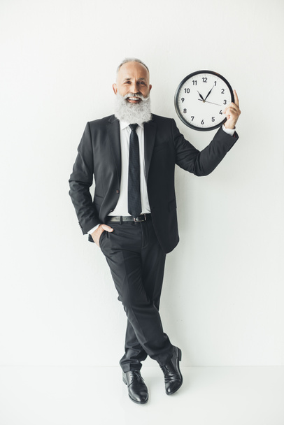 mature businessman with clock - Photo, Image