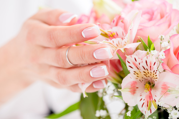 female hand with flowers - Photo, Image