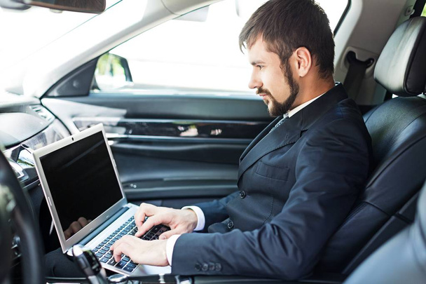 business man using mobile and laptop - Φωτογραφία, εικόνα