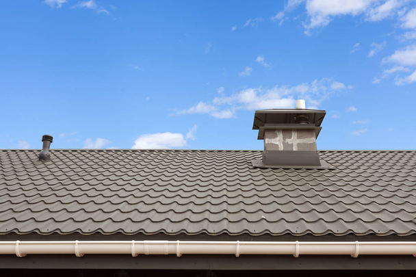 New gray metal tile roof with chimney. - Photo, Image