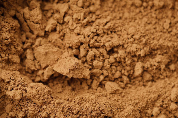 Смятый какао порошок для приготовления пищи прекрасный вид
 - Фото, изображение